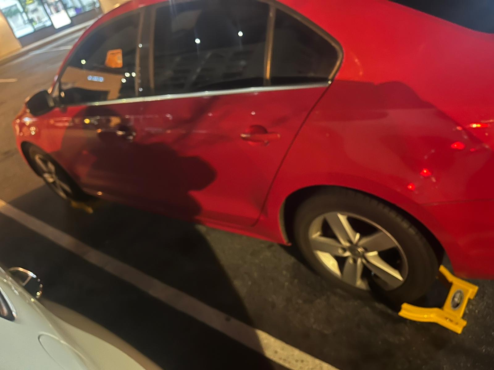 Red car booted